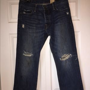 Men’s dark wash destroyed jeans